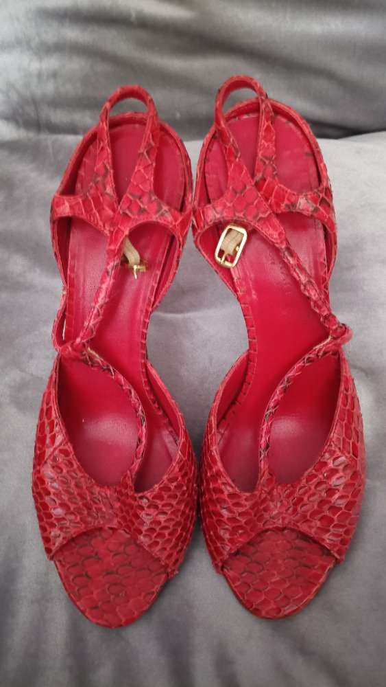 Red heels with T-bar strap by Donna Karan