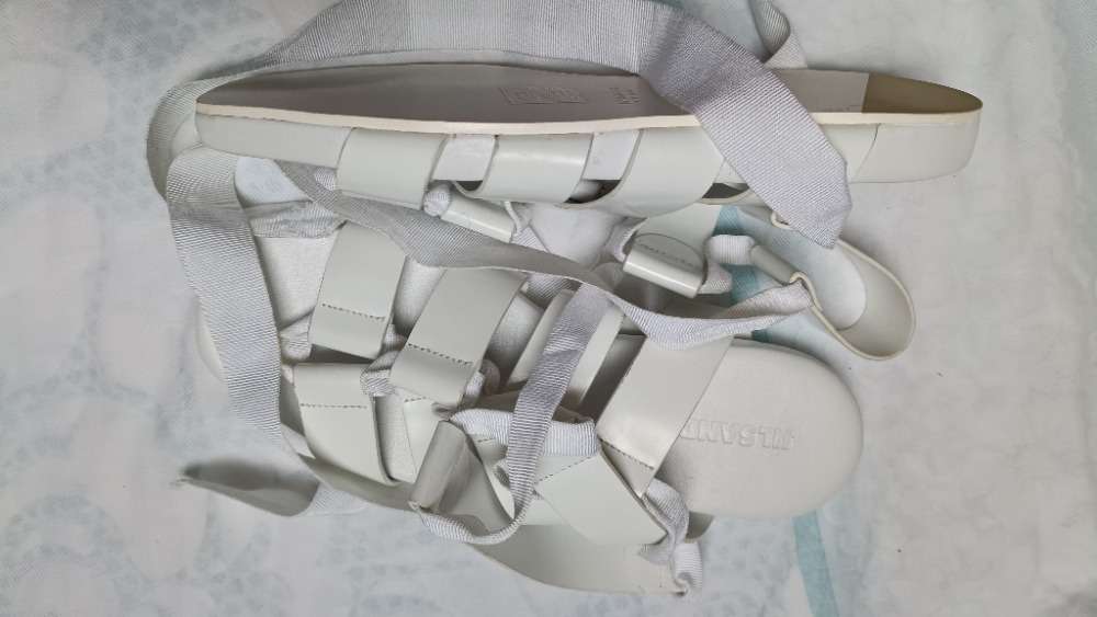 White strappy flat sandals by Jill Sander