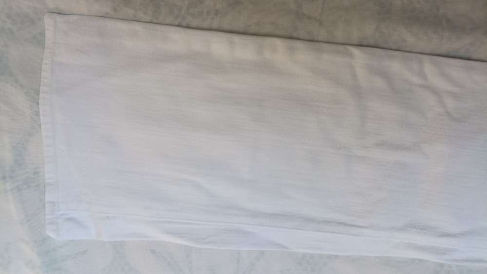 White bootcut jeans by J Brand