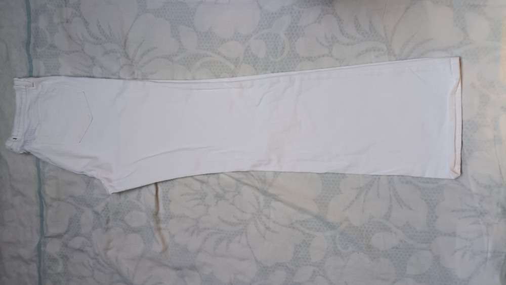 White bootcut jeans by J Brand