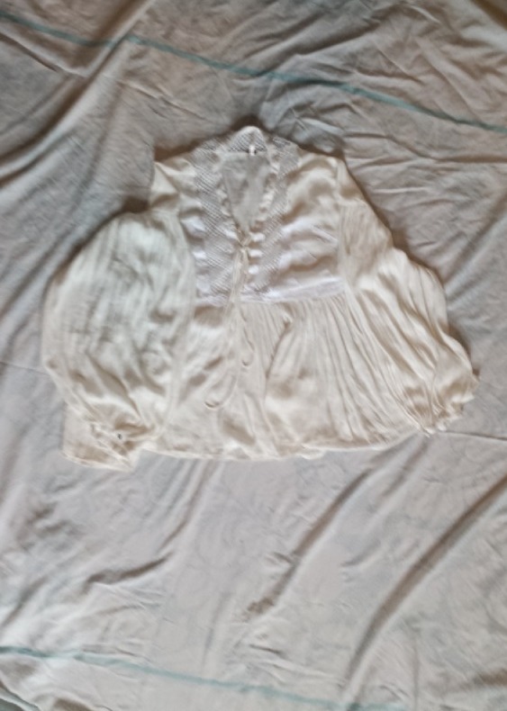 white whimsical blouse by Free People