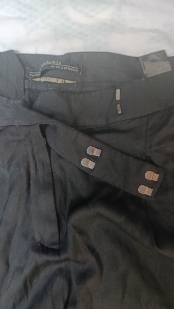 Black tapered trousers by All Saints