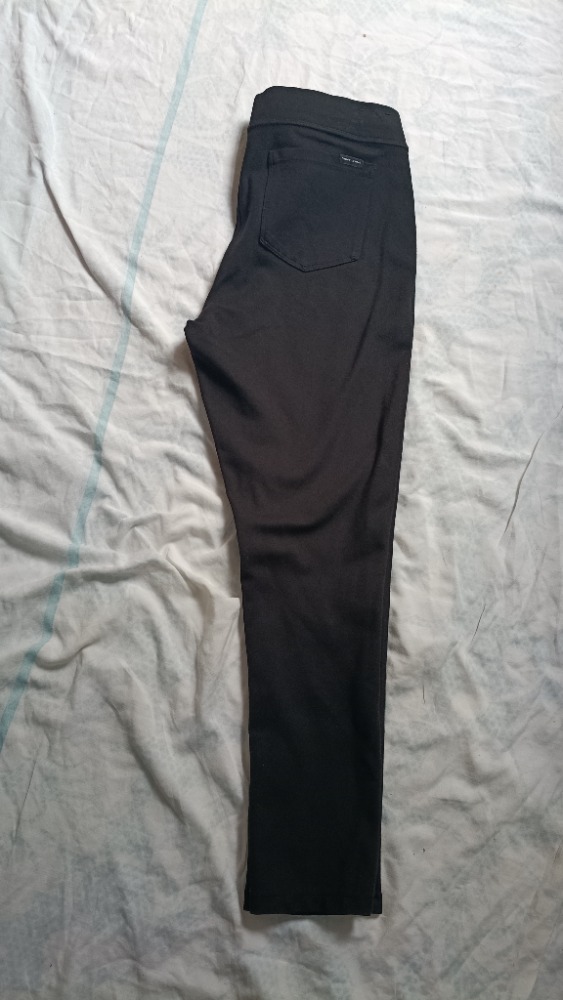 Black stretchy slim trousers by DKNY