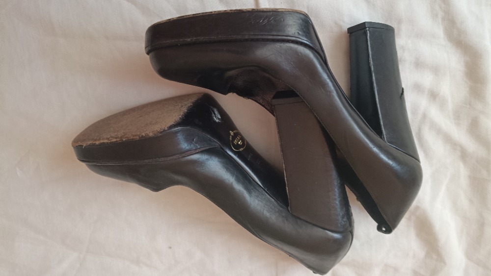 Black platform heels by Prada