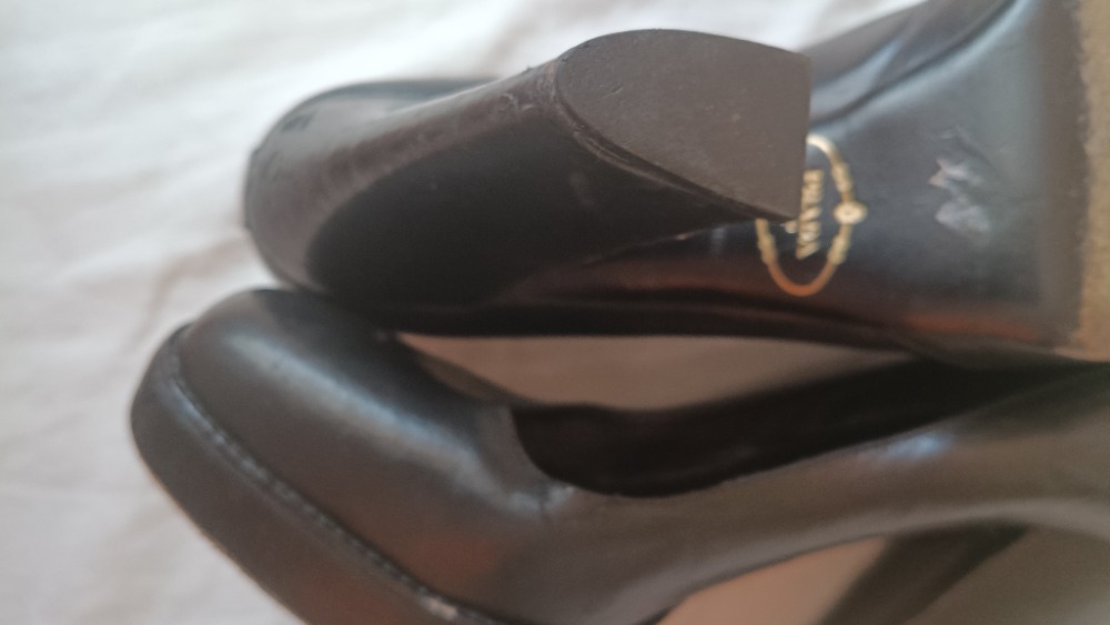 Black platform heels by Prada