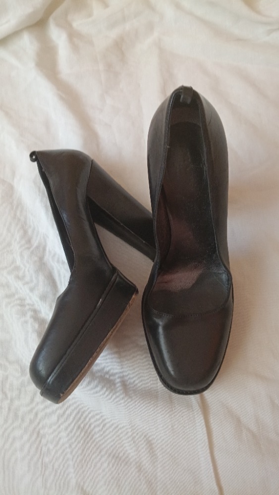 Black platform heels by Prada