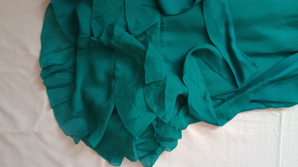 Green dress with ruffles by Rebecca Taylor