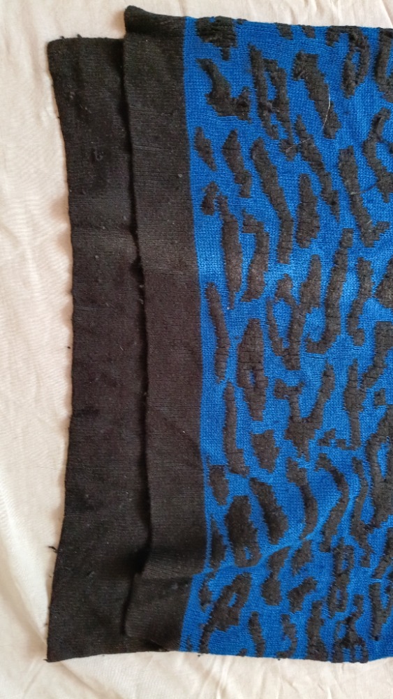 Blue jumper with animal print and black spots by Sandro