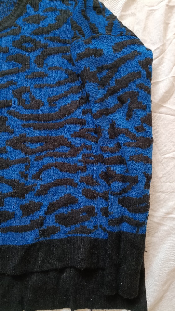 Blue jumper with animal print and black spots by Sandro