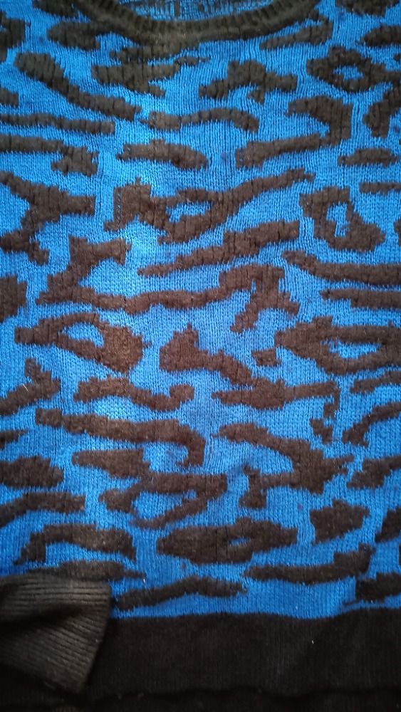 Blue jumper with animal print and black spots by Sandro