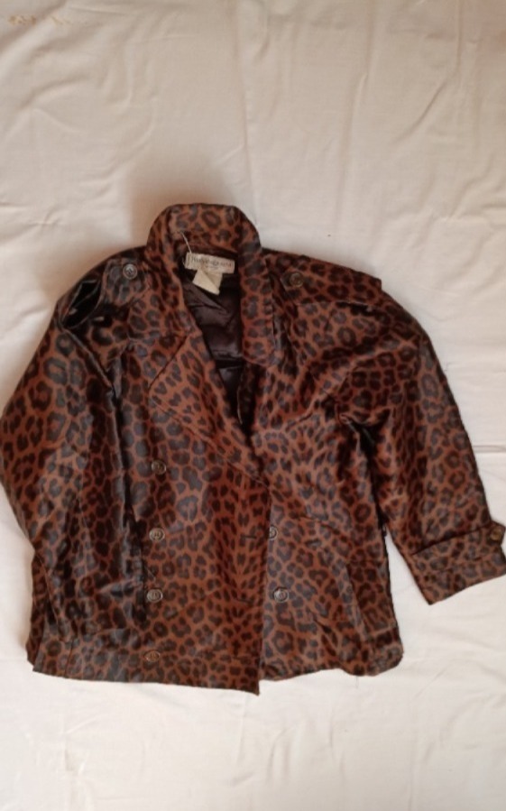 Brown animal print trench coat by YSL