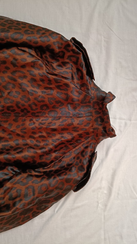 Brown animal print trench coat by YSL