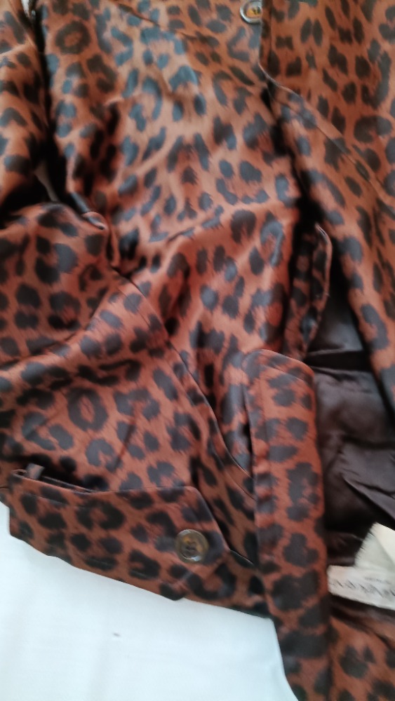 Brown animal print trench coat by YSL