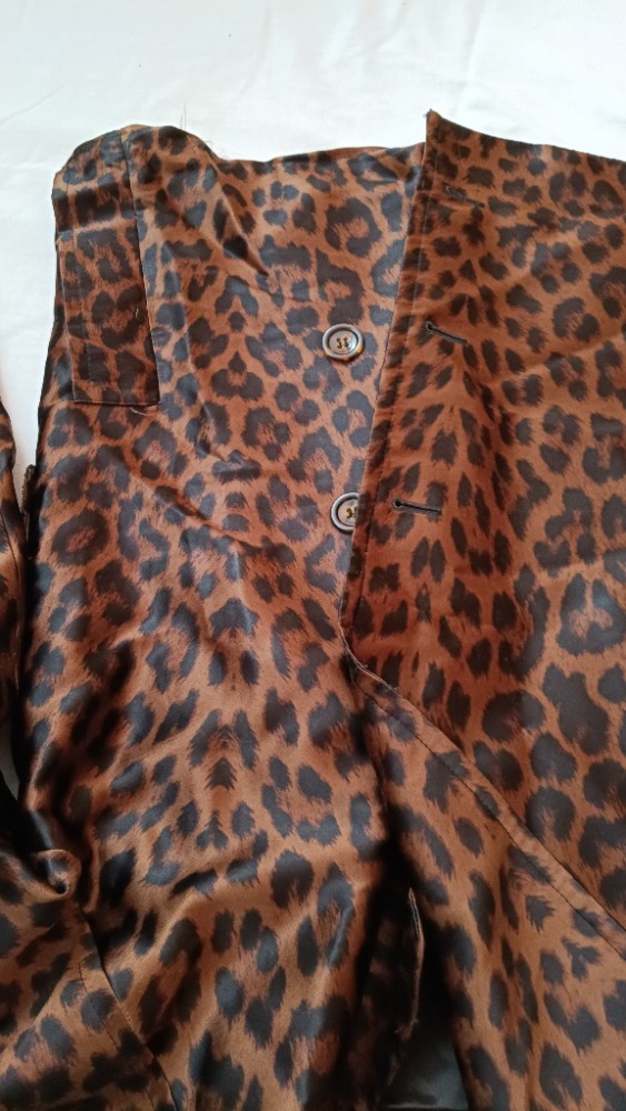 Brown animal print trench coat by YSL
