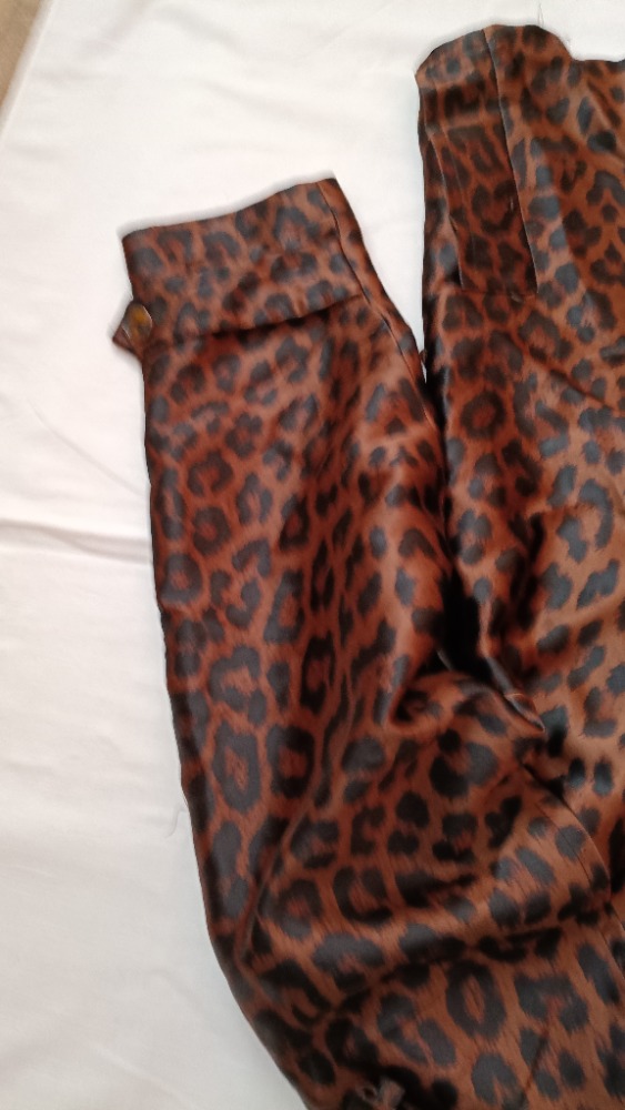 Brown animal print trench coat by YSL