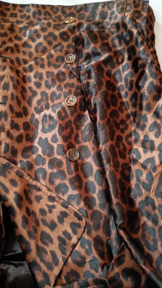 Brown animal print trench coat by YSL